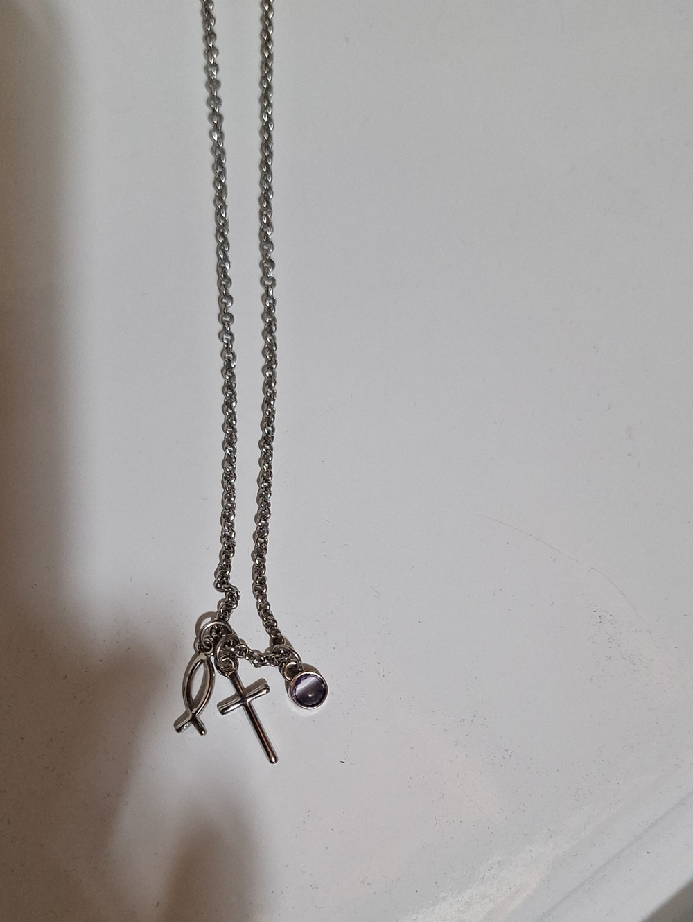 Lia Sophia Silver Cross and Ribbon Pendant Necklace with Purple Stone